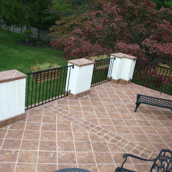 - Ceramic tile on outside, second floor patio.